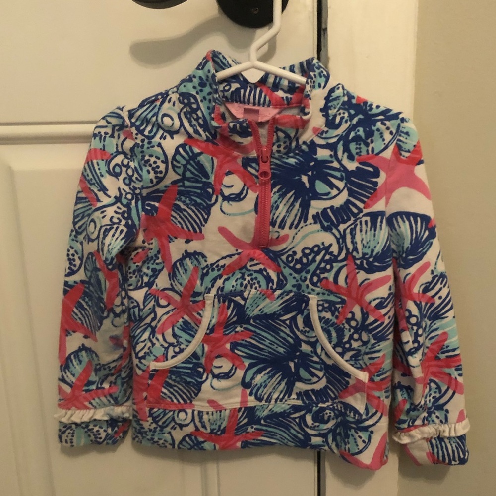 Lily Pulitzer pullover with ruffle.